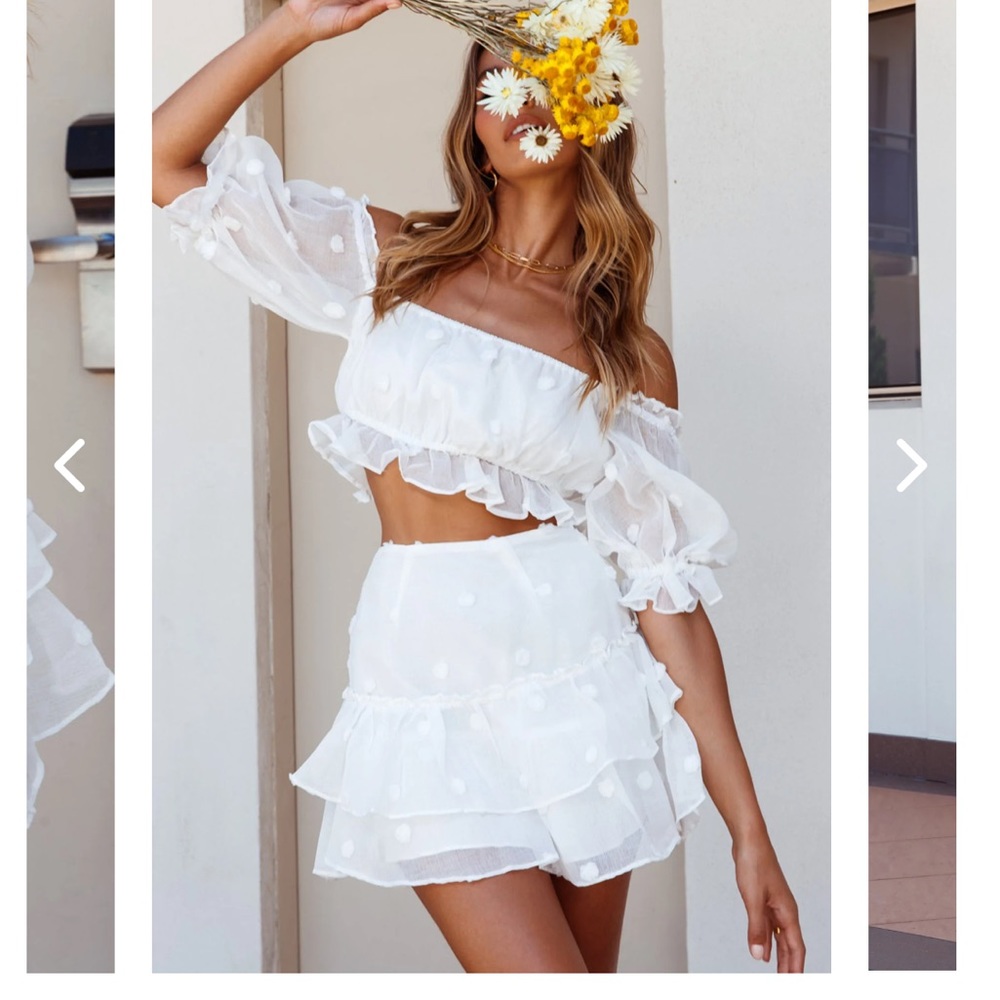 Selfie Leslie “Krista” off the shoulder pompom top and mini skirt set
